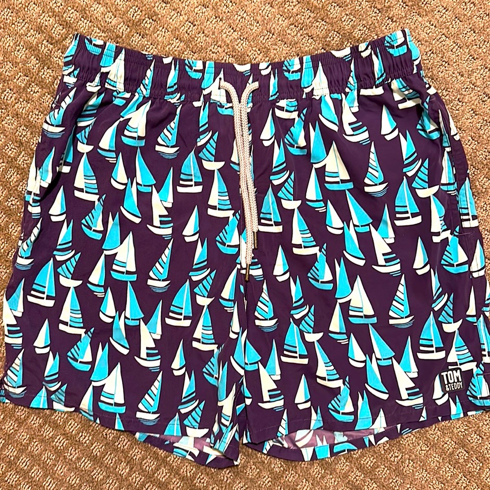 Tom and Teddy size medium swim shorts with inner liner. Like new.